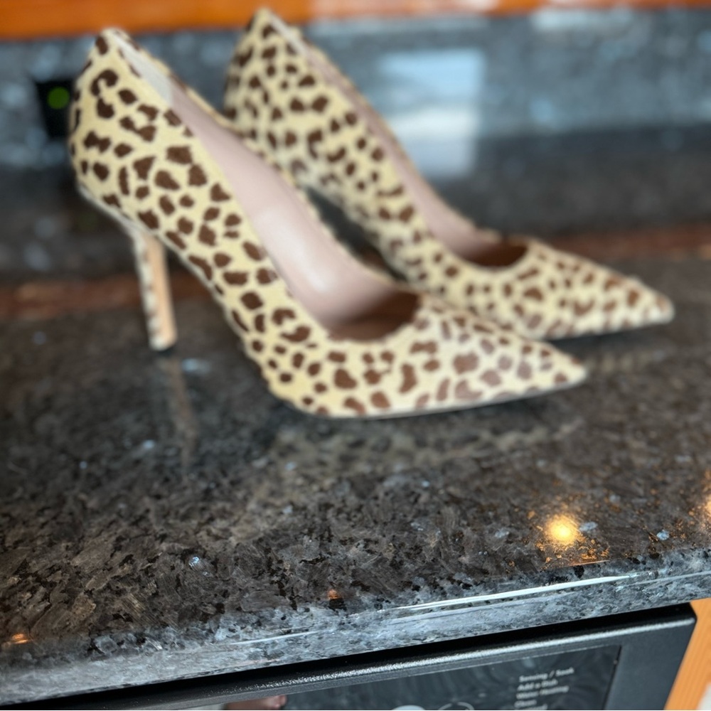 Emerson Fry's leopard heels are 4-inch pumps